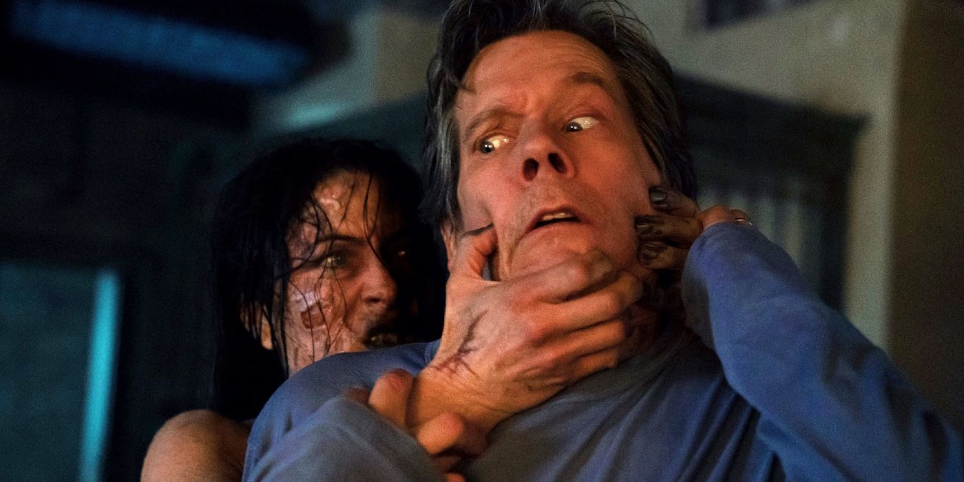 A woman grabbing a man (Kevin Bacon) from behind and choking him in You Should Have Left