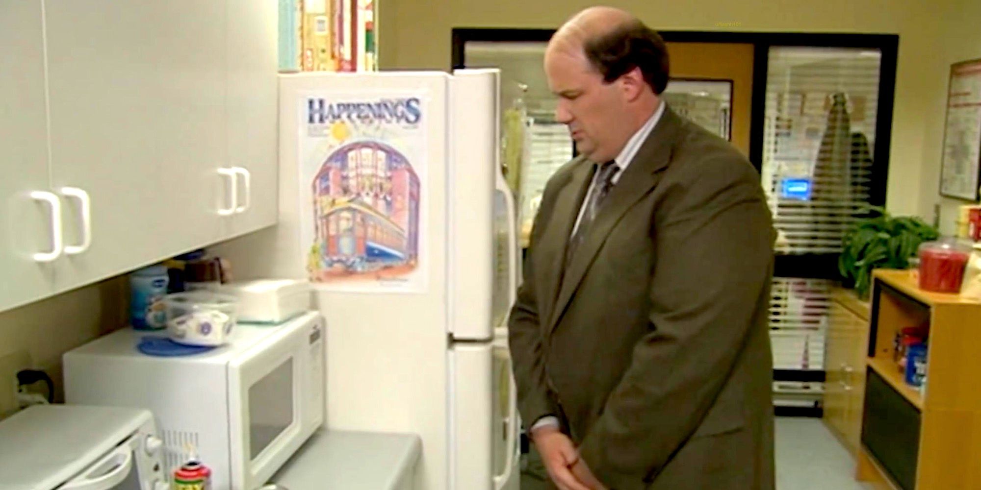 Kevin Using The Microwave In The Office
