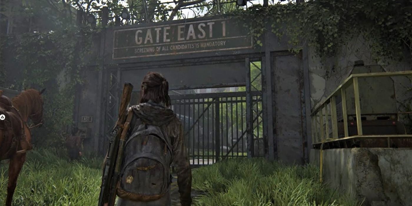 Ellie in Last of Us 2 looking at the closed East Gate 1