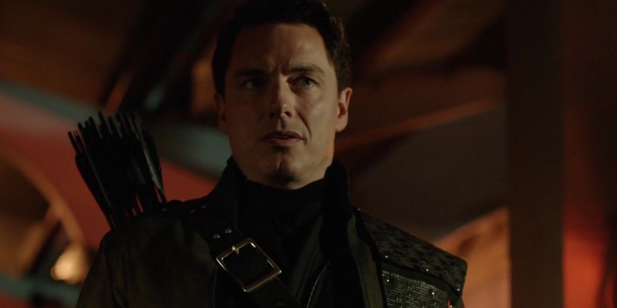 Malcolm Merlyn in his Black Archer costume in Arrow
