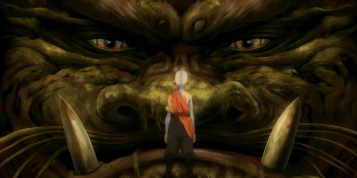 Aang stands in front of a lion turtle in The Last Airbender