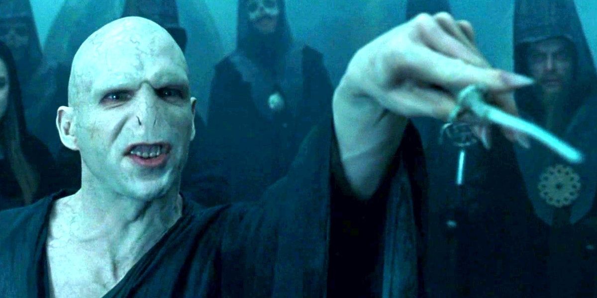 Voldemort pointing his wand at someone