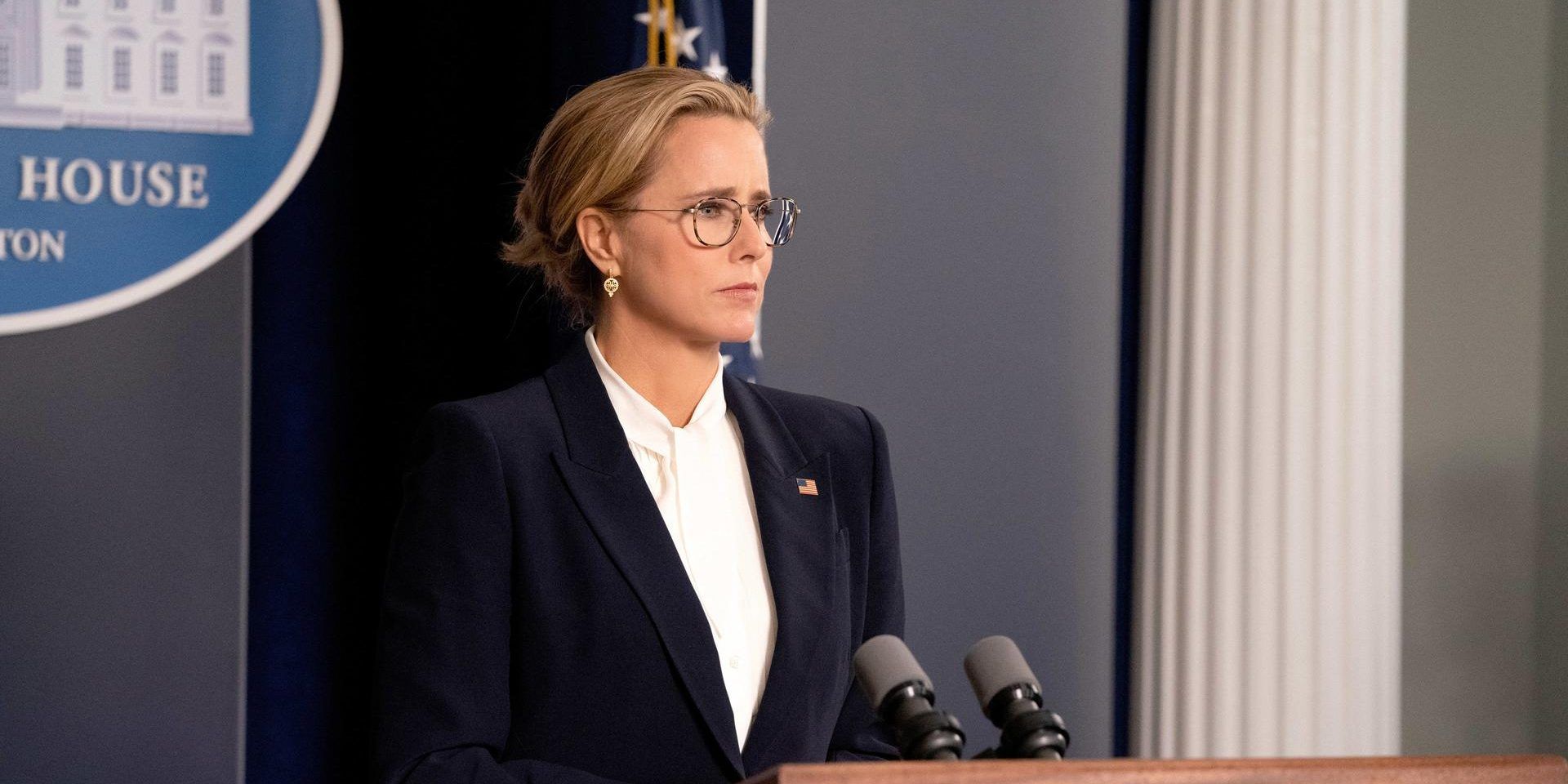 Tea Leoni standing at a podium in Madam Secretary