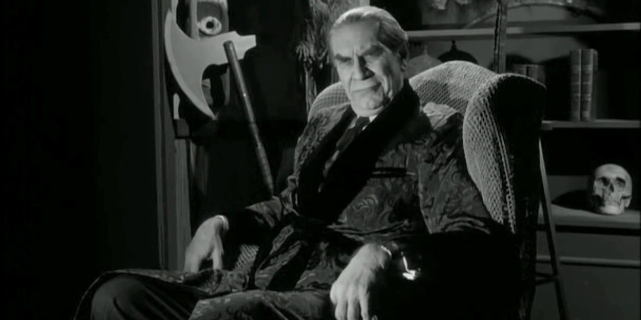 Bela Lugosi sitting on a chair and frowning in Ed Wood.
