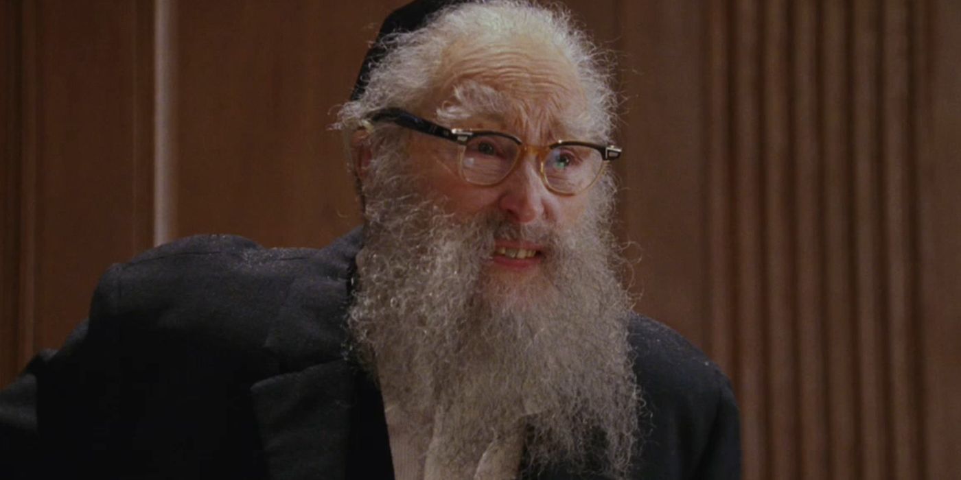 The Rabbi talks to a character off-screen