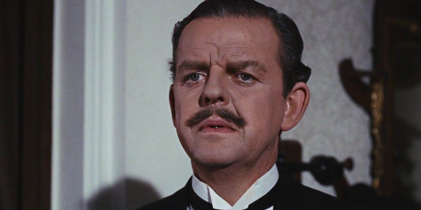 David Tomlinson as Mr. Banks with a furrowed brow in Mary Poppins