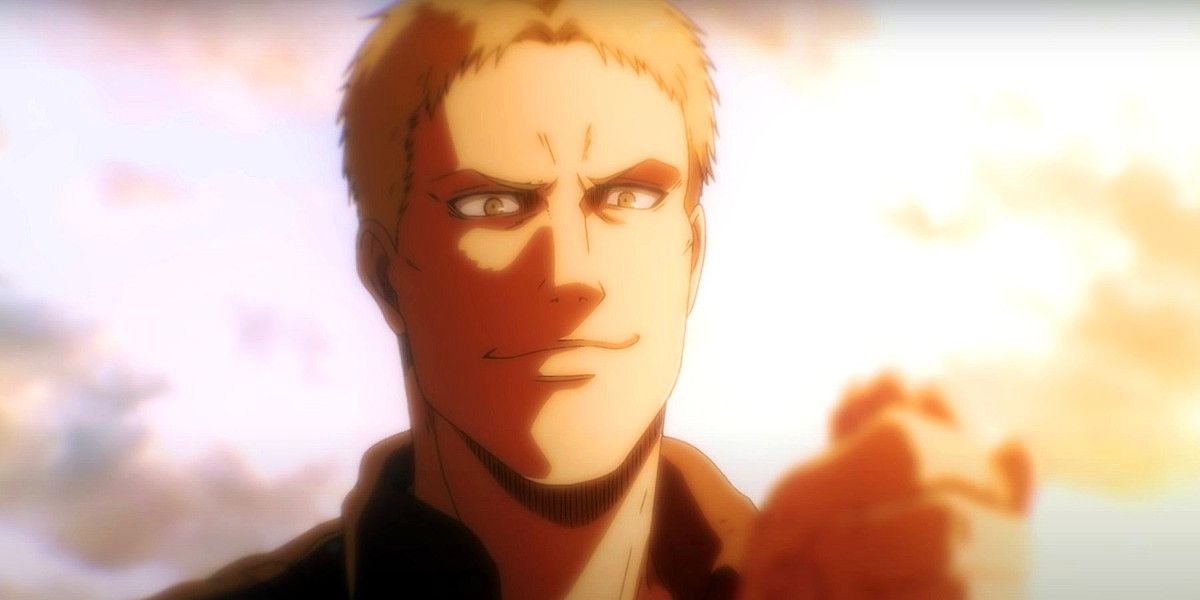 Reiner frowning and looking angry in Attack on Titan