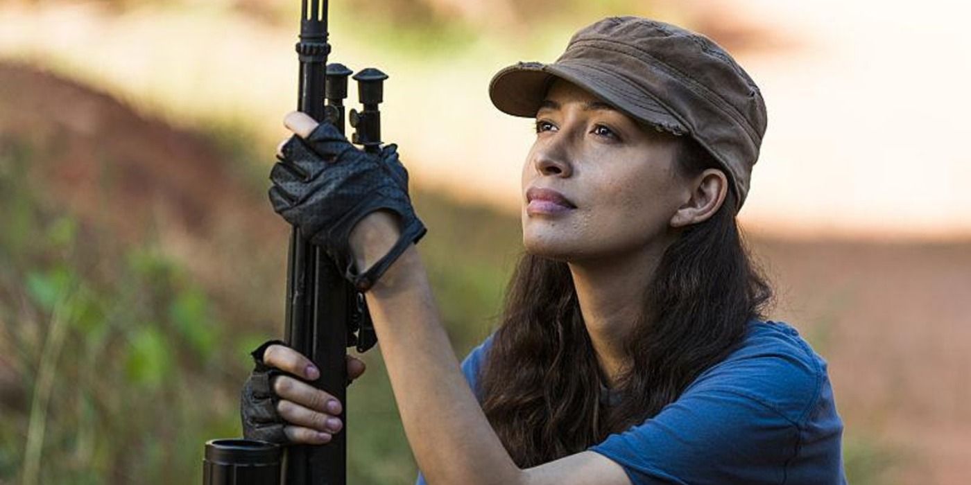 Rosita holding a gun on The Walking Dead.