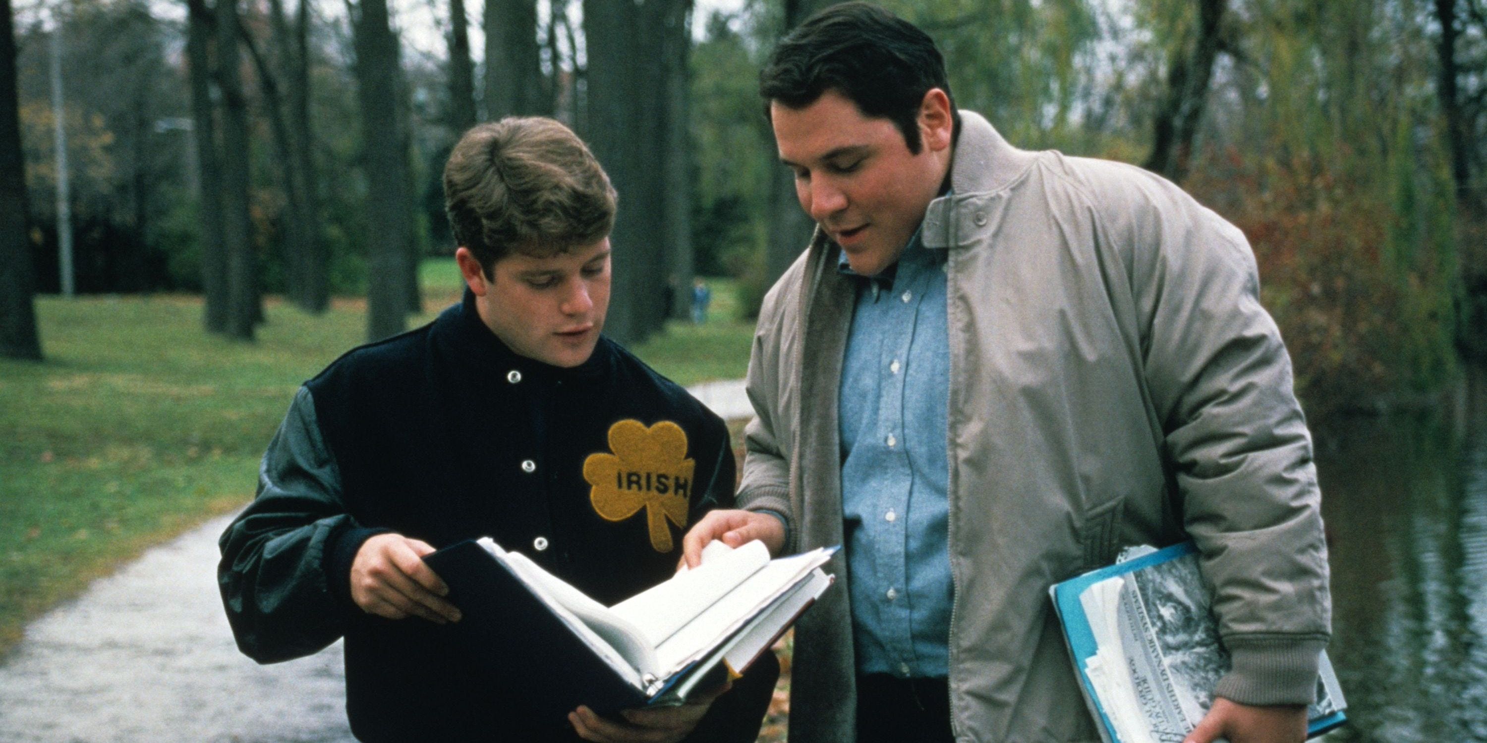 Sean astin and Jon Favreau standing next to each other in Rudy