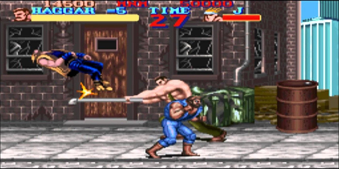 Two characters duke it out in Final Fight
