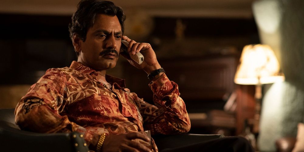Gaitonde talking to someone on the phone in Sacred Games