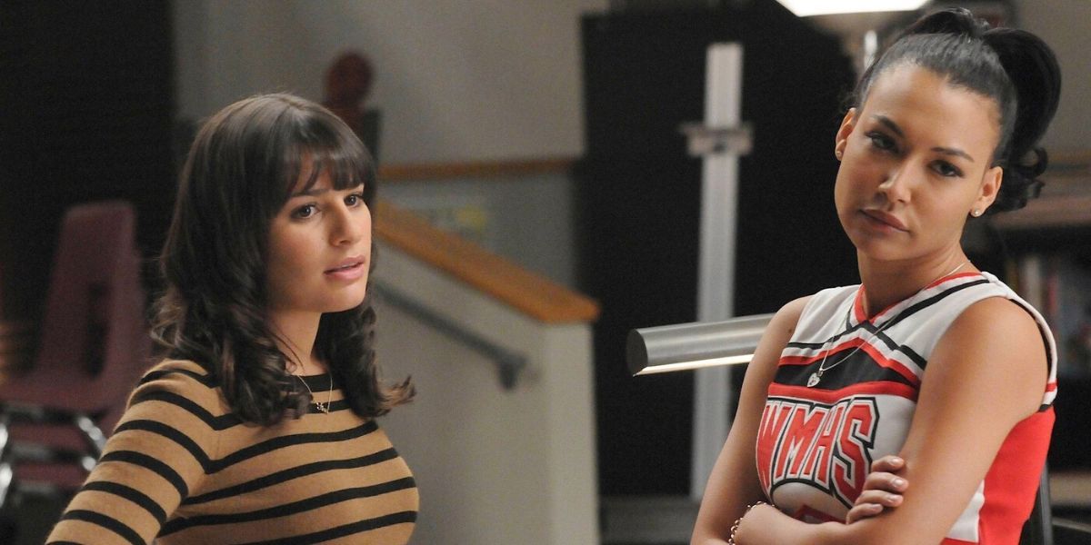Santana and Rachel looking annoyed in Glee