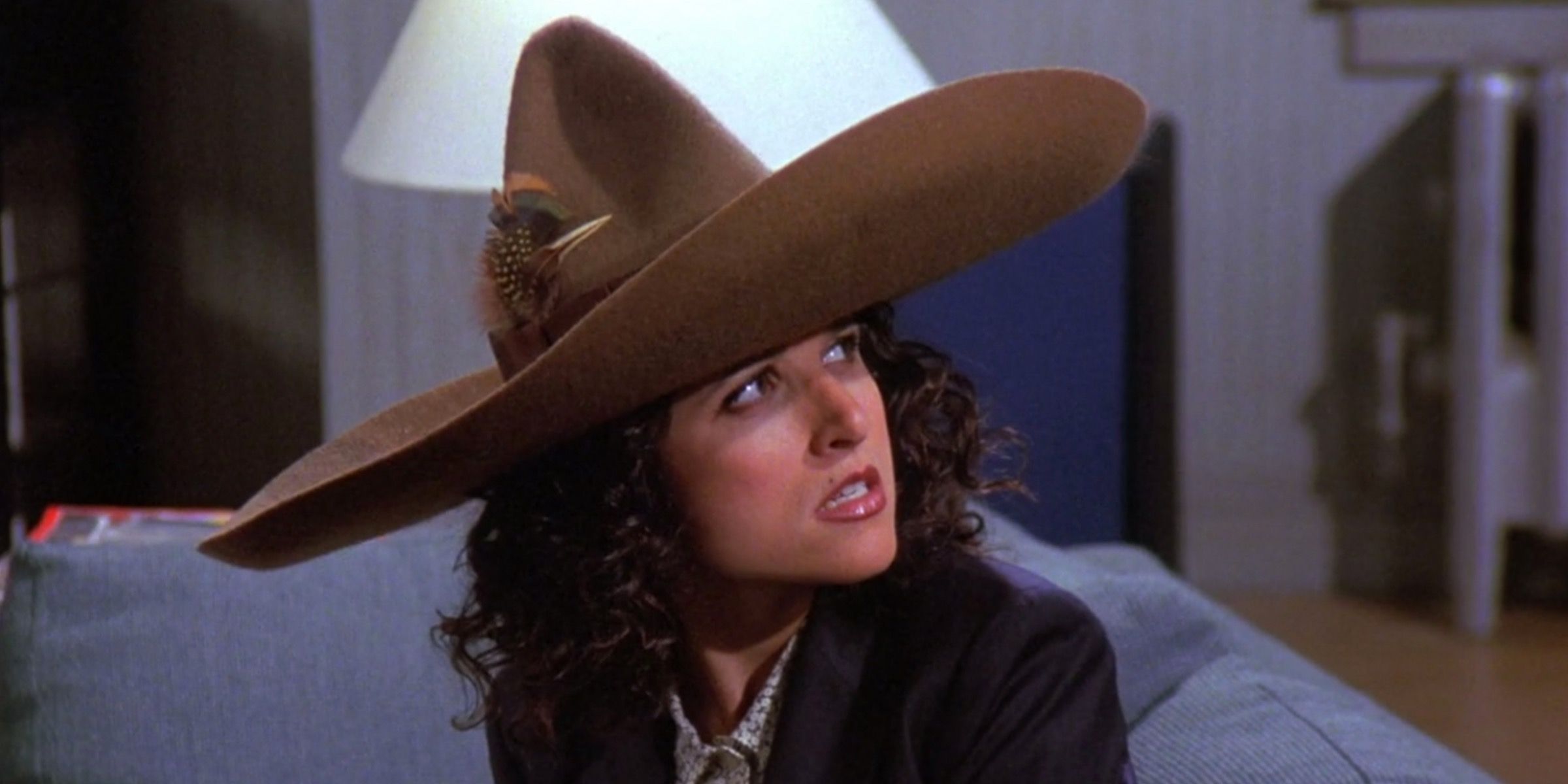 Elaine wearing Peterman's Urban Sombrero on Seinfeld