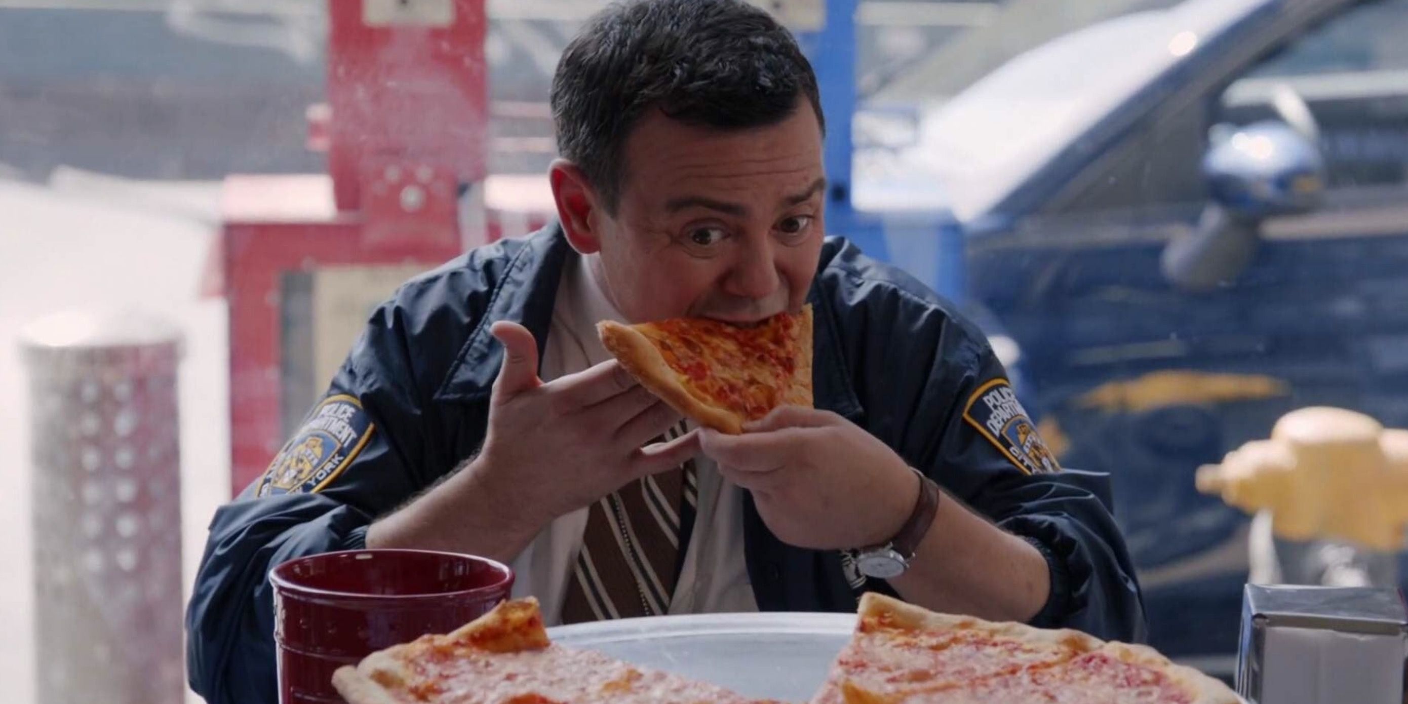 Charles Boyle eats pizza in Brooklyn Nine Nine