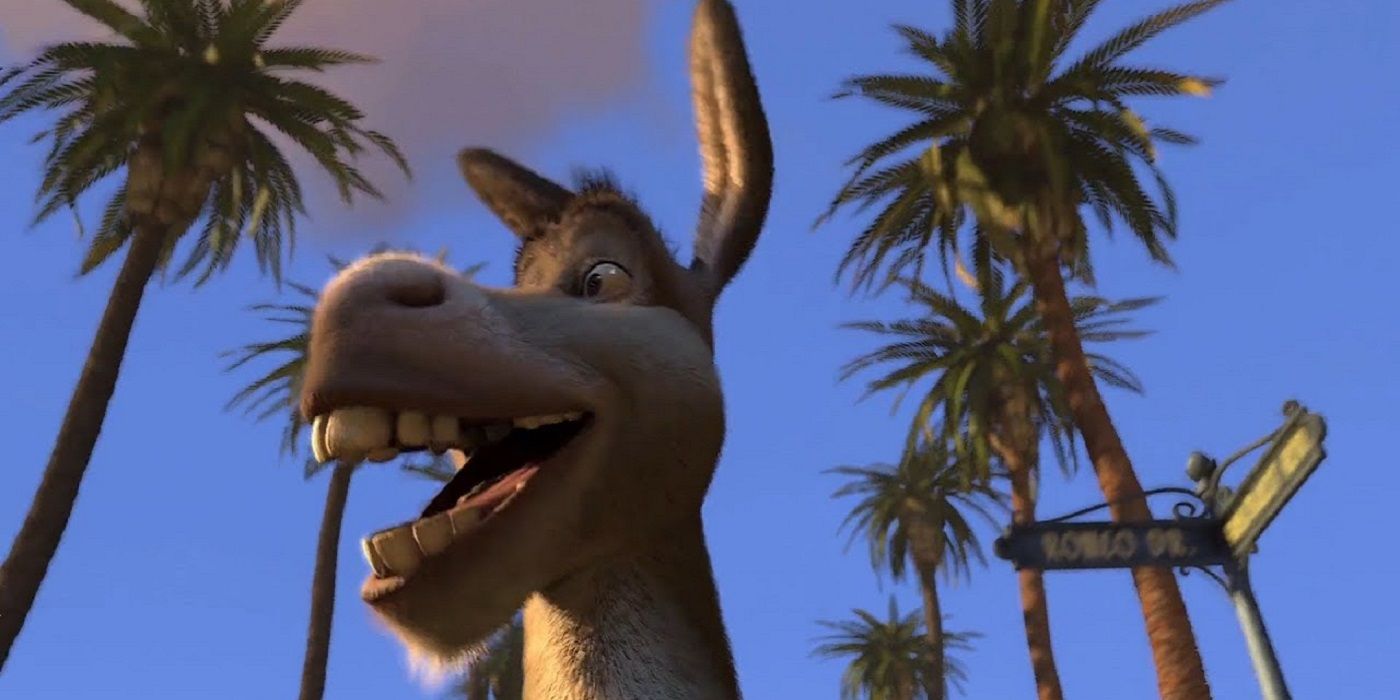 Donkey by some palm trees