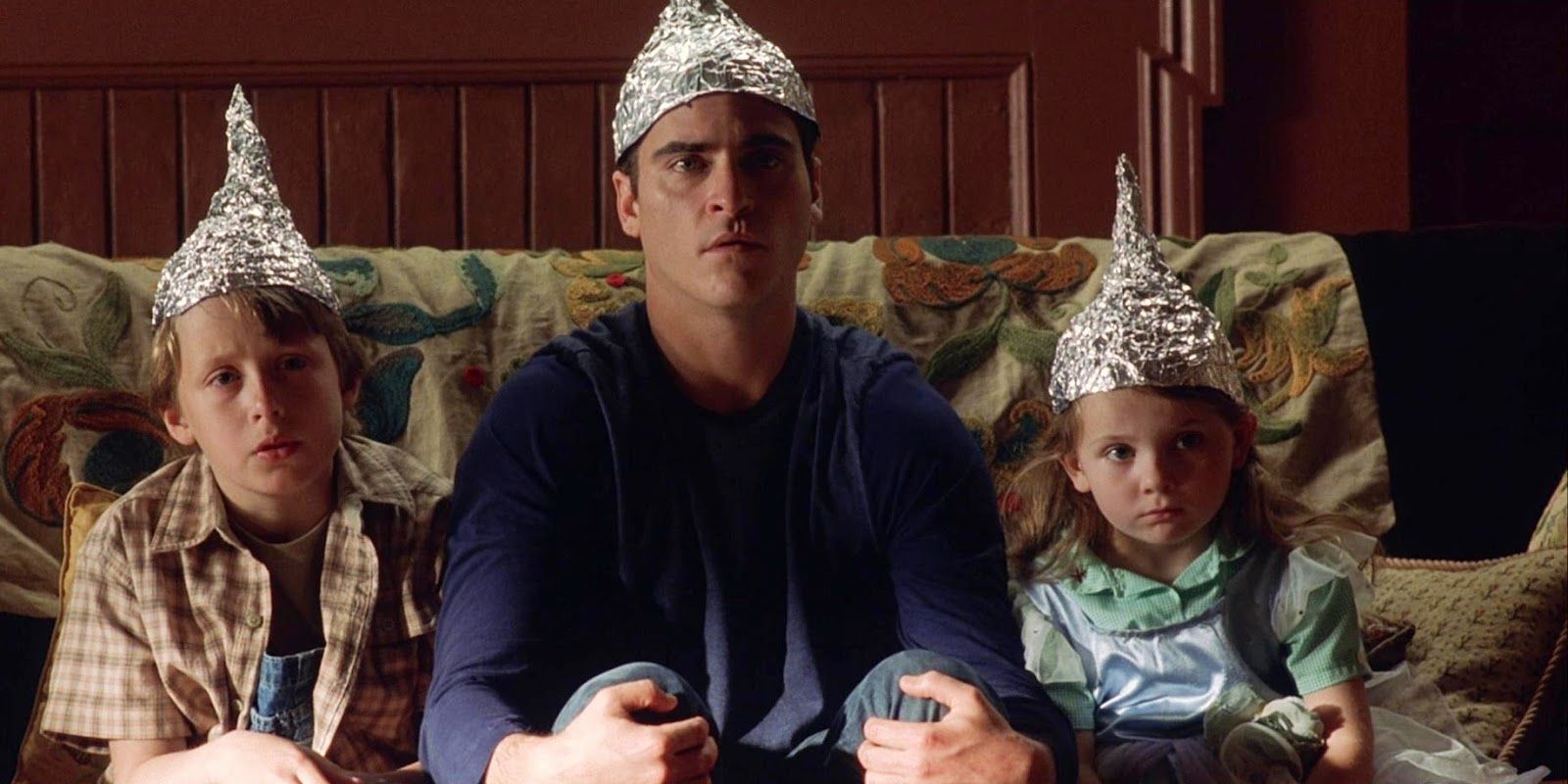 Wearing tinfoil hats in Signs