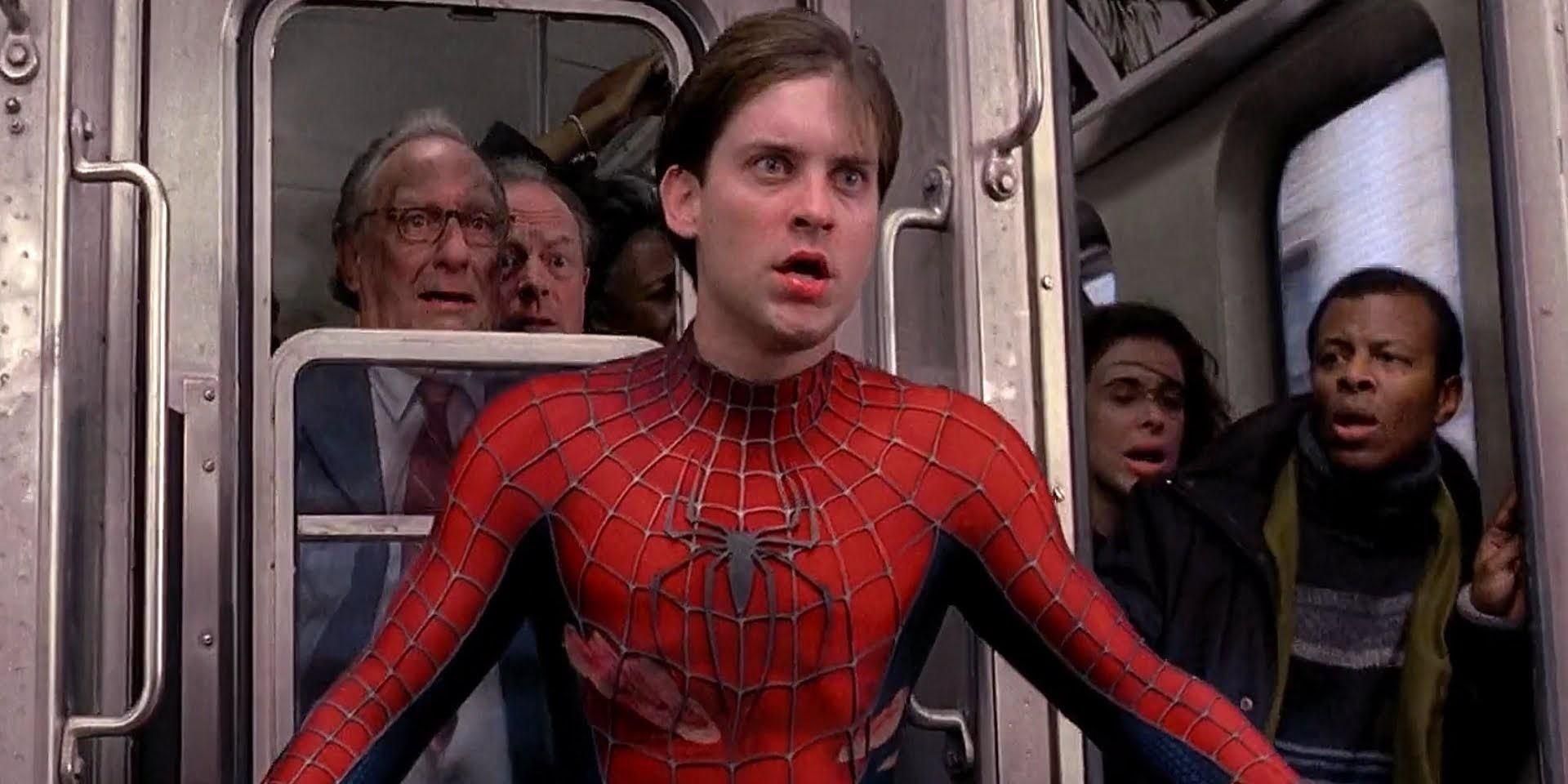 Spider-Man stands on the front of a train in Spider-Man 2