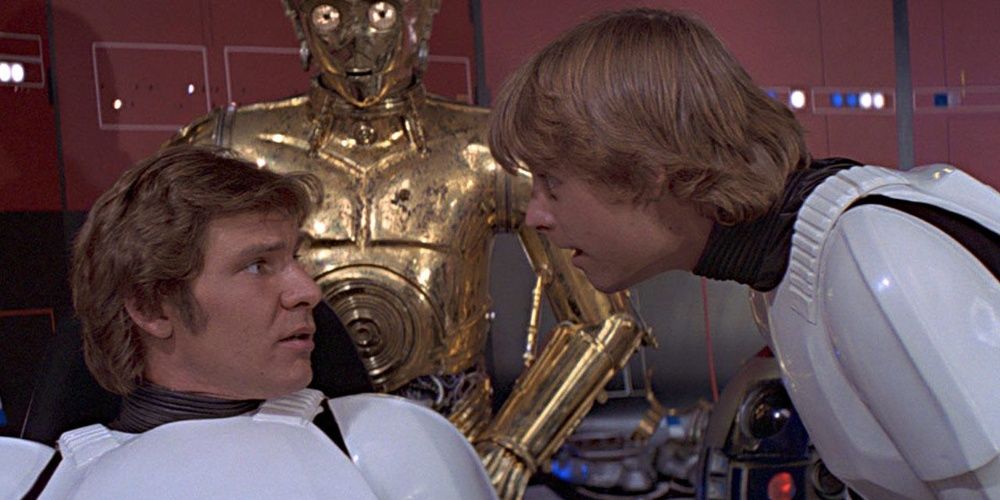 Han Solo wearing a stormtrooper suit chastising Luke Skywalker in Star Wars A New Hope