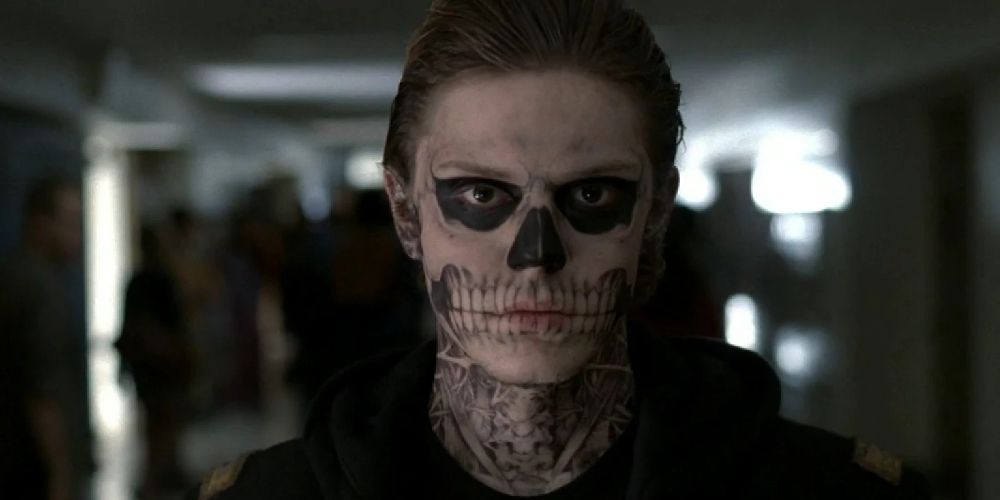 Evan Peters as Tate Langdon with a skull-painted face