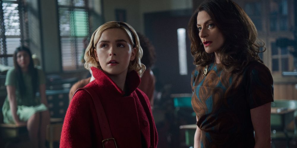 Kiernan Shipka and Michelle Gomez in The Chilling Adventures Of Sabrina