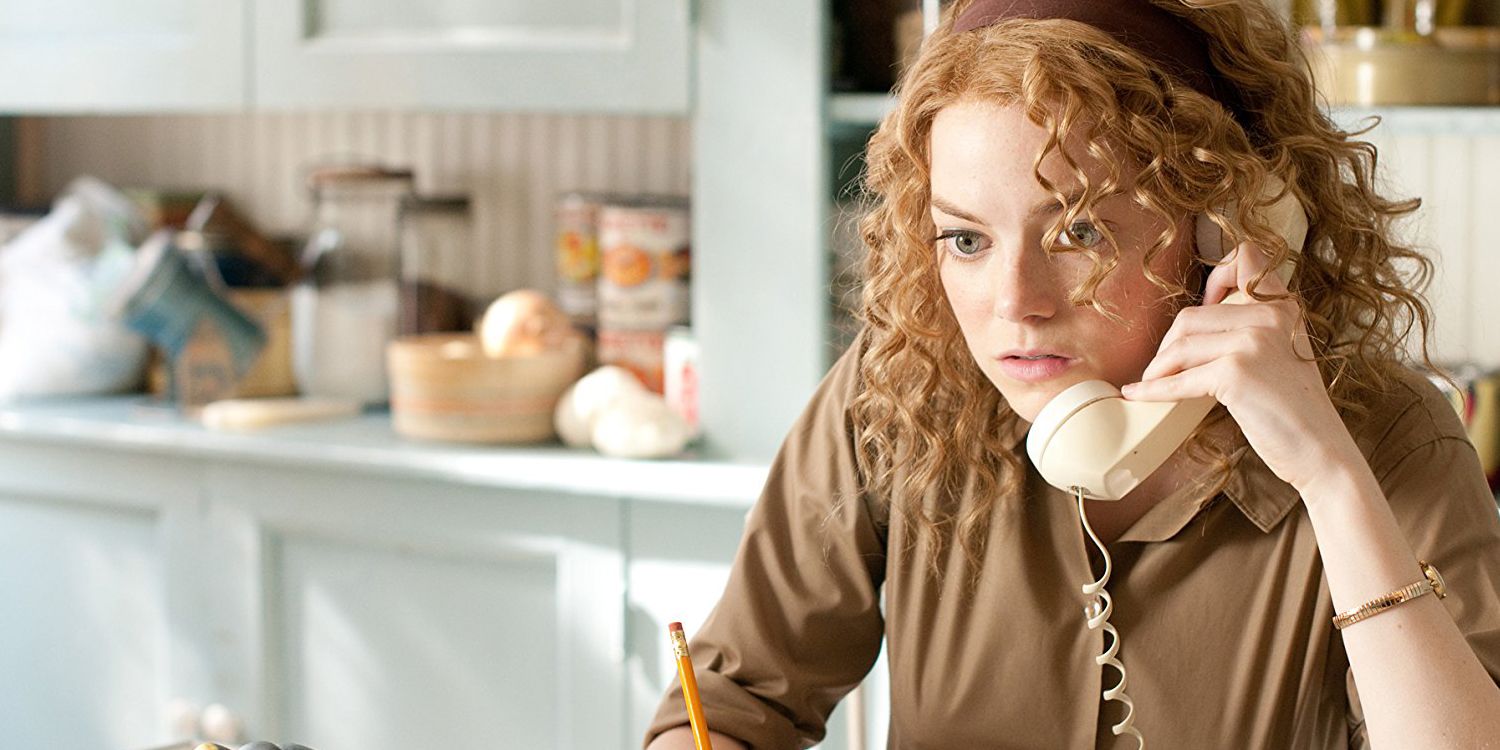 Emma Stone listens on the phone in The Help.