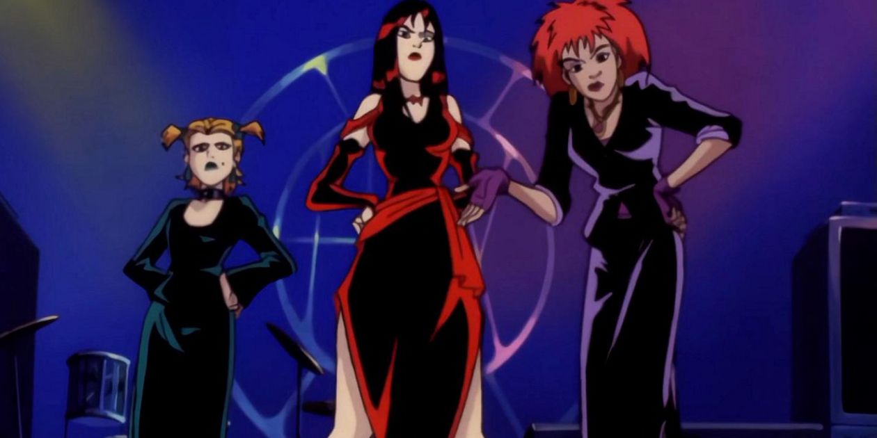 The Hex Girls stand on stage in Scooby-Doo and the Witch's Ghost