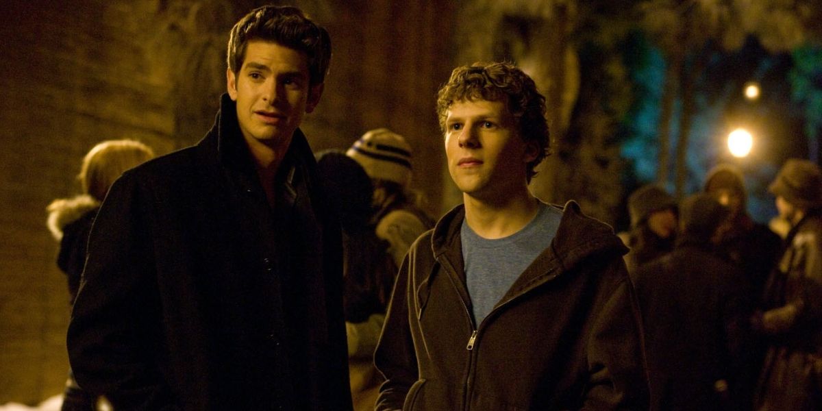 Mark and Eduardo outside in winter in The Social Network
