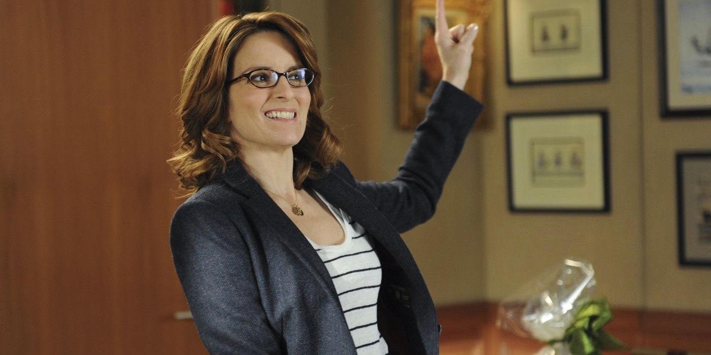 Liz Lemon from 30 Rock with her finger in the air