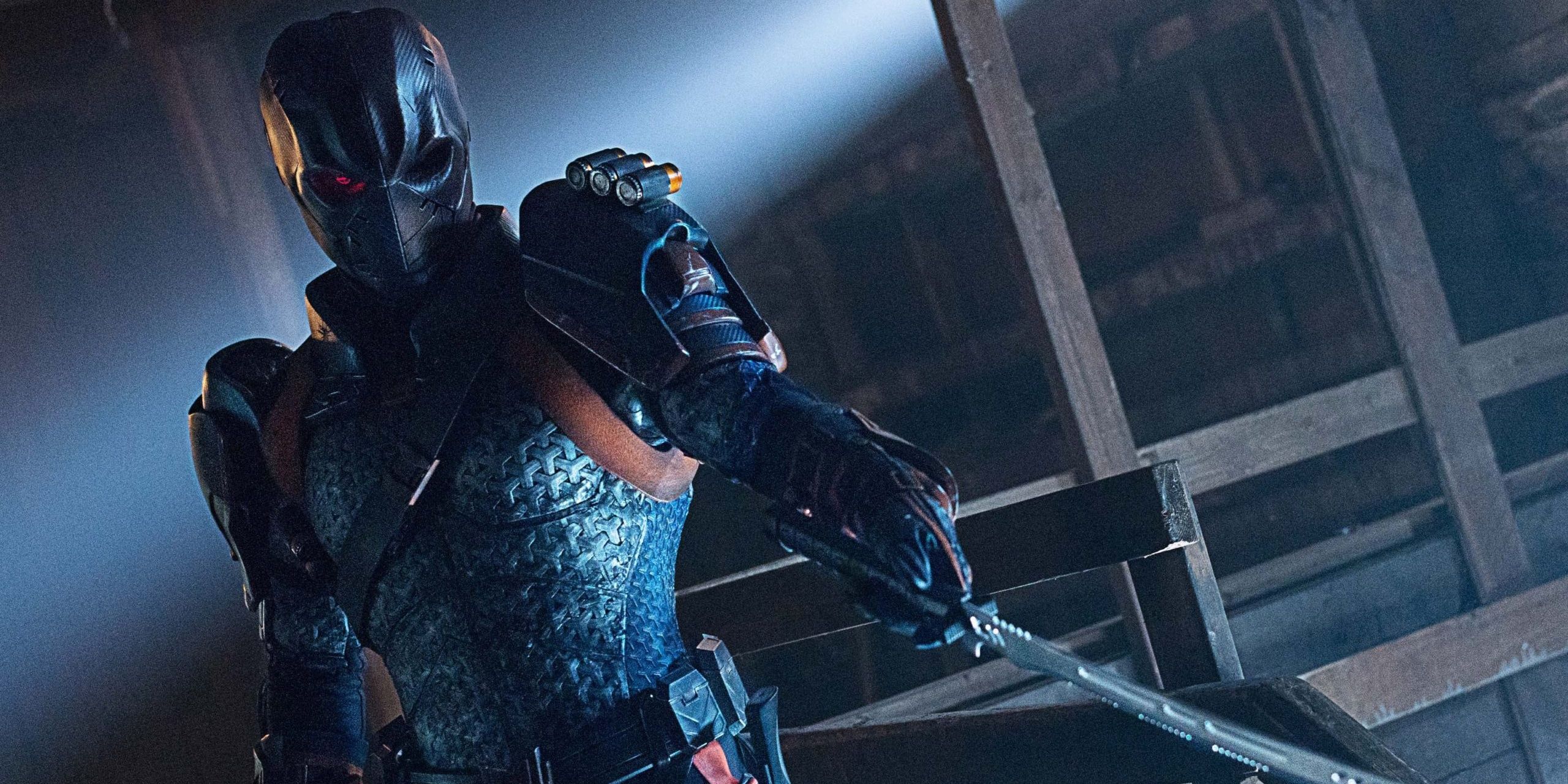 Deathstroke pointing his sword down at someone in Titans