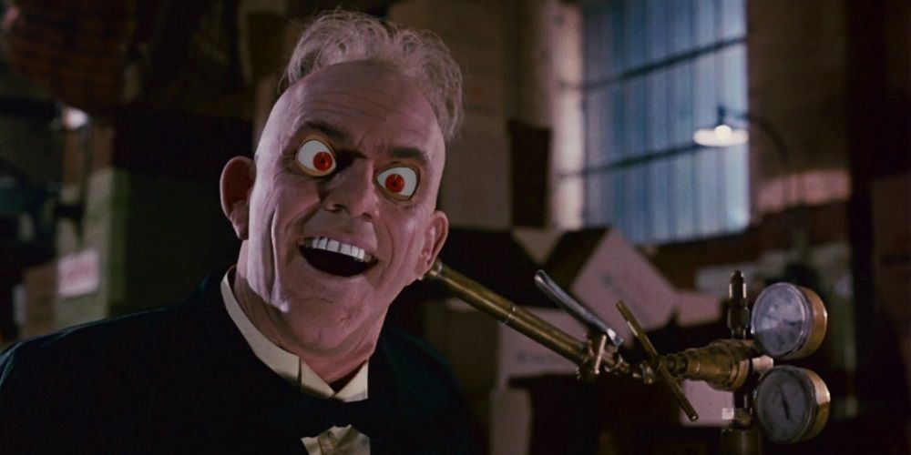 Judge Doom grins with red eyes in Who Framed Roger Rabbit