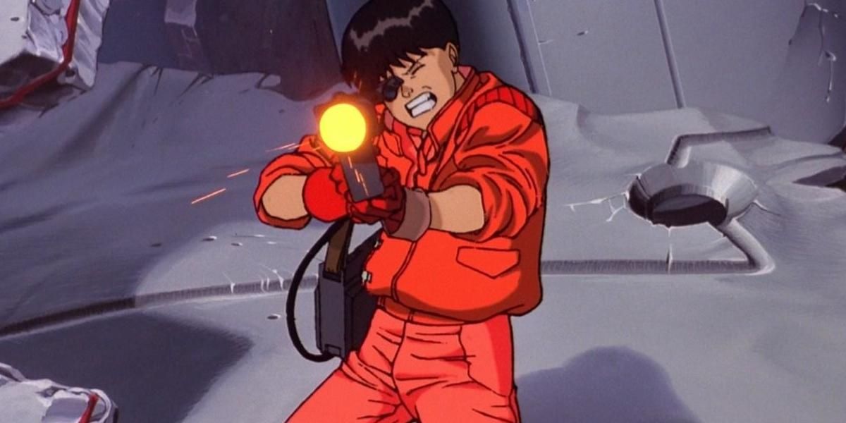 The main character in Akira pointing a gun and firing