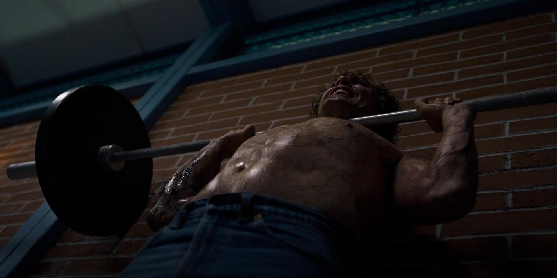 Billy being hit with a bench-press in Stranger Things
