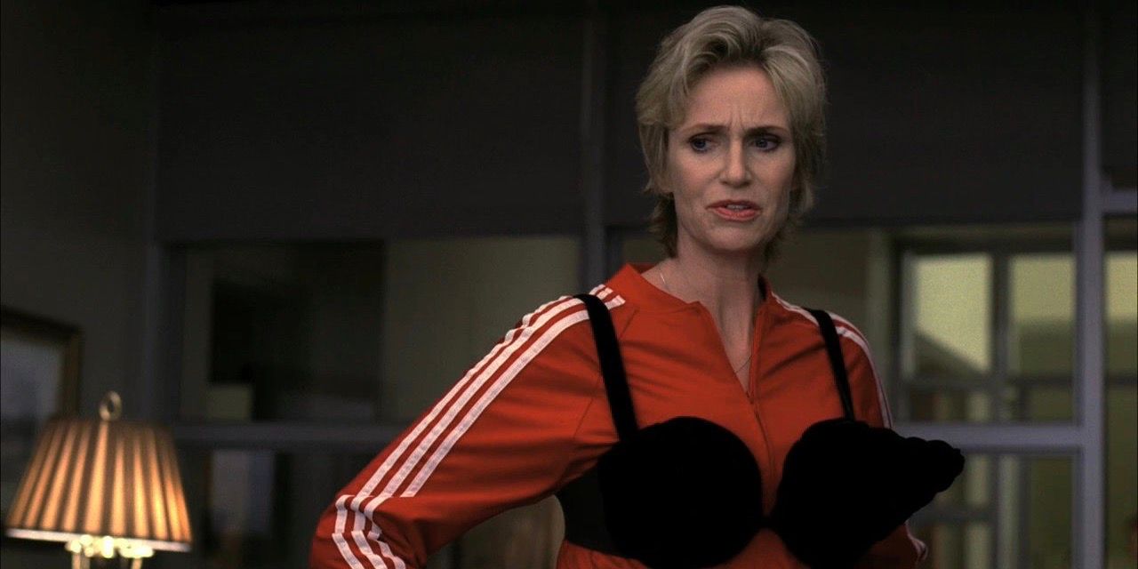 Sue wearing a Madonna-like cone bra over her tracksuit in Glee