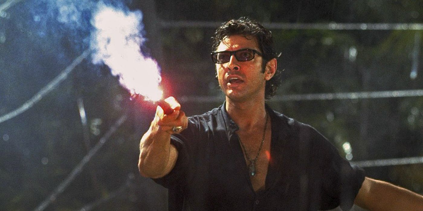 Ian Malcolm holding a flare in Jurassic Park