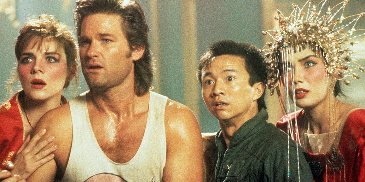 Kurt Russell and the cast in Big Trouble in Little China looking shocked