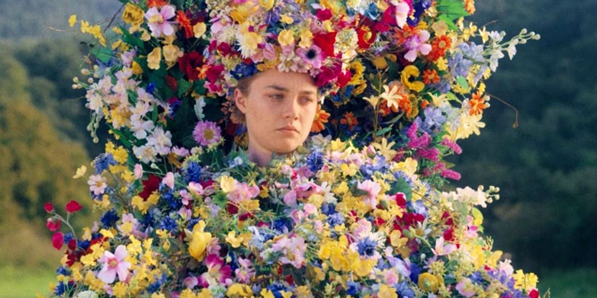 Dani covered in flowers in Midsommar.