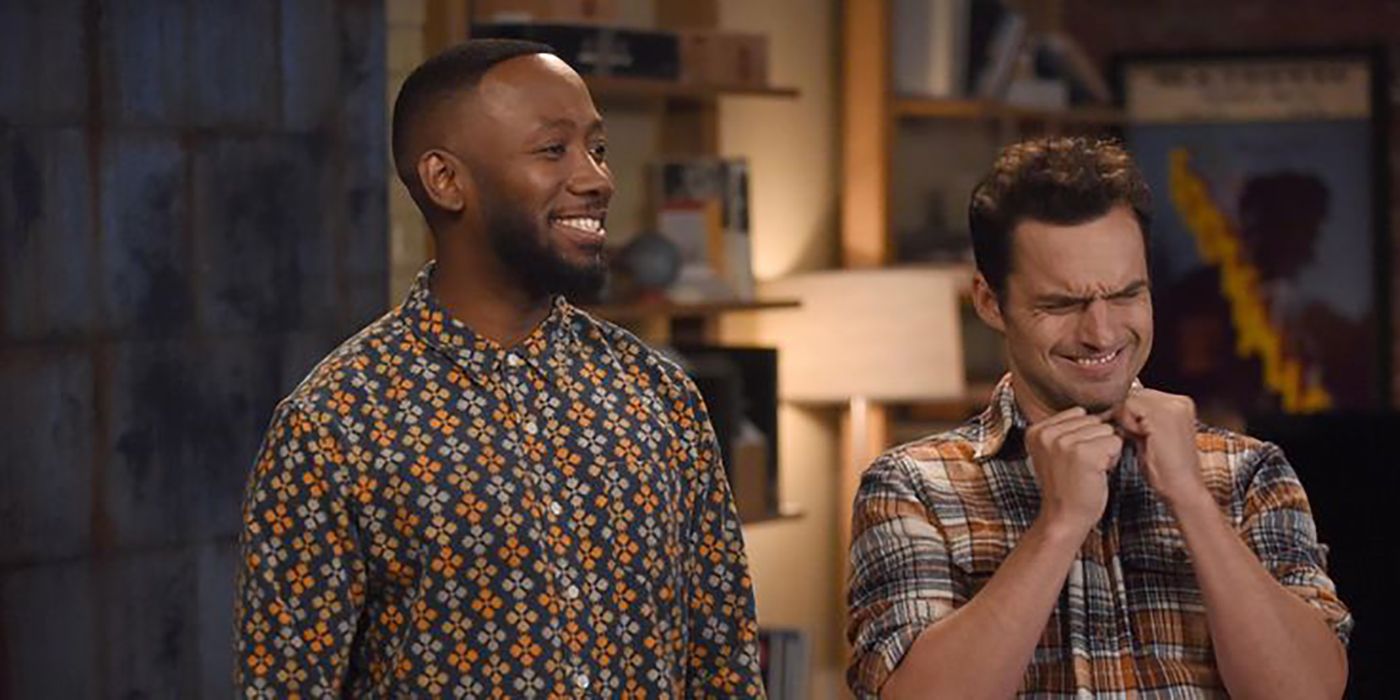 Winston and Nick grinning in New Girl