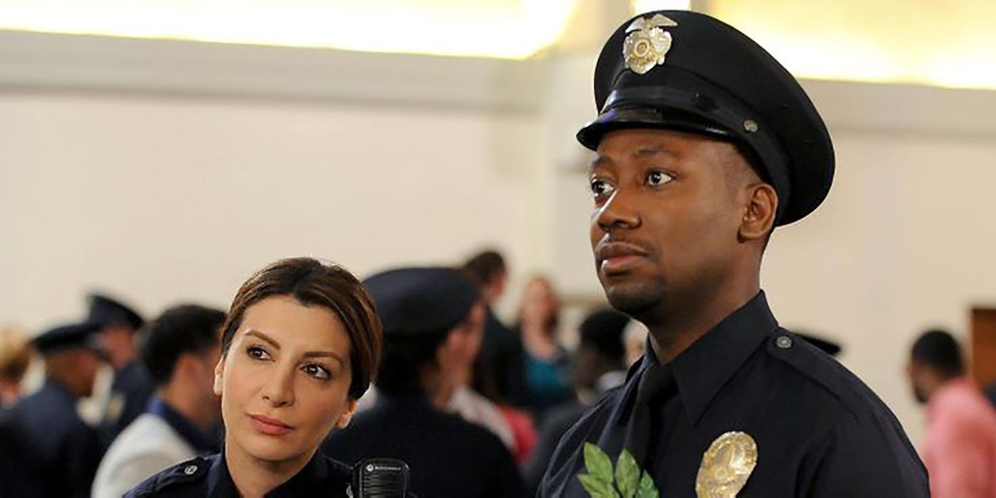 Winston in police uniform with Aly on New Girl