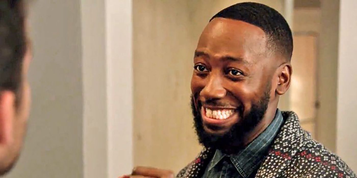 Winston smiling in New Girl.