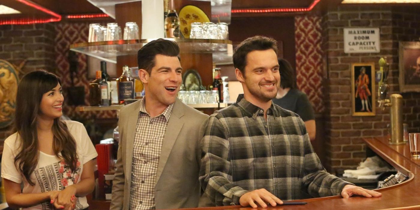 Cece, Schmidt, and Nick behind the bar in New Girl