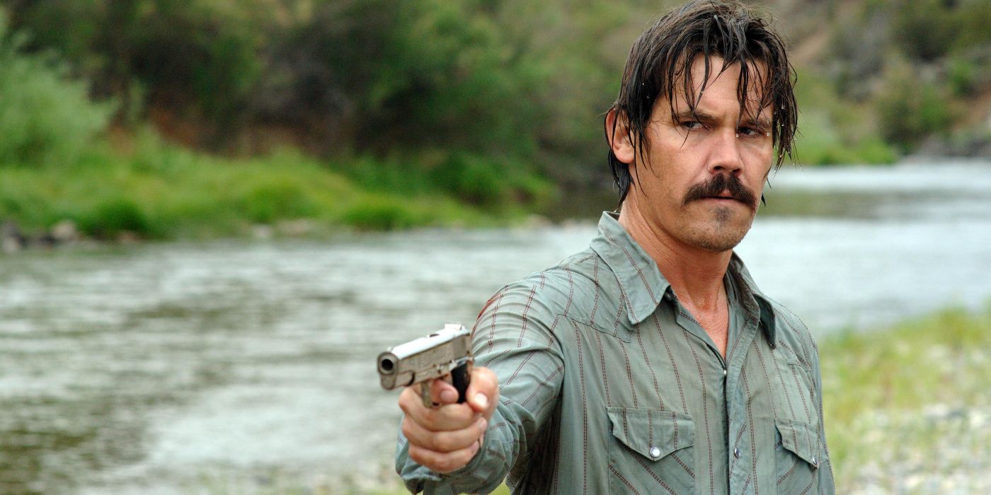 Josh Brolin with a gun in No Country for Old Men
