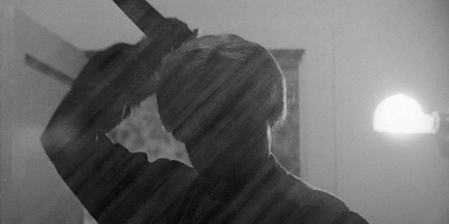 Norman Bates silhouette as he stabs woman in shower