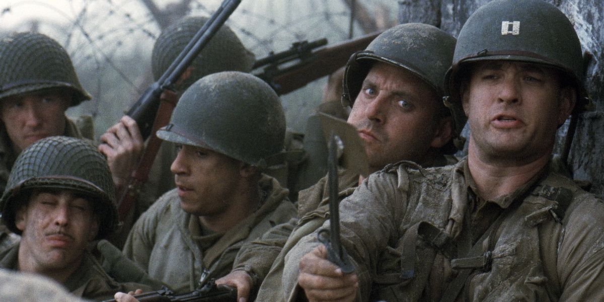 Tom Hanks and his platoon hiding behind a wall in Saving Private Ryan