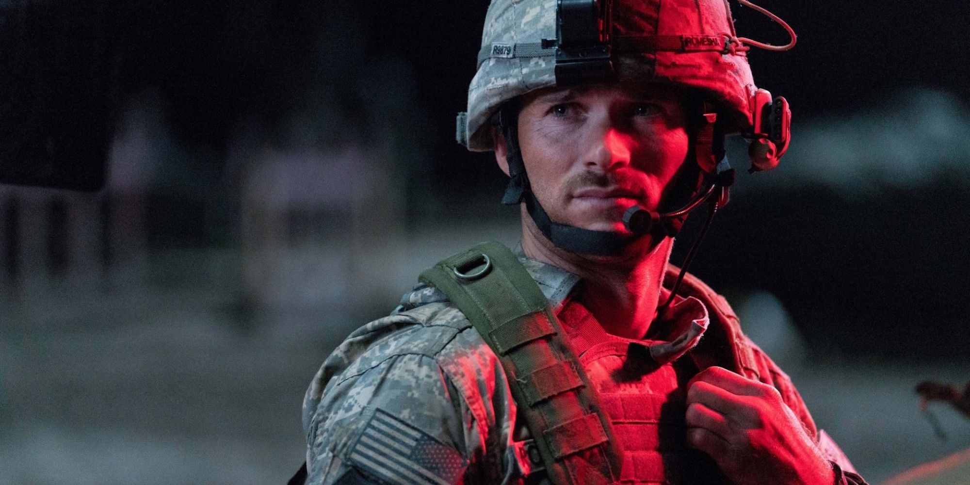Scott Eastwood in military helmet at night in The Outpost