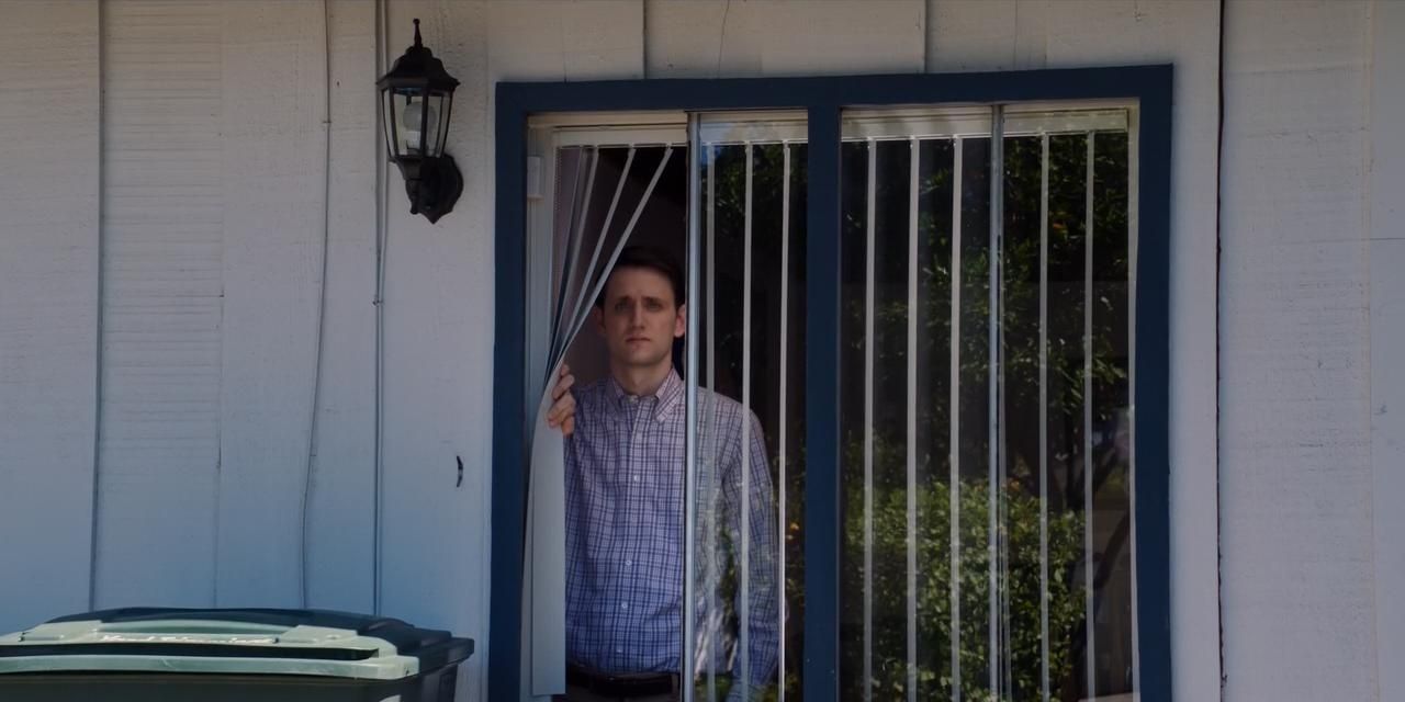 Jared looking out a window in Silicon Valley