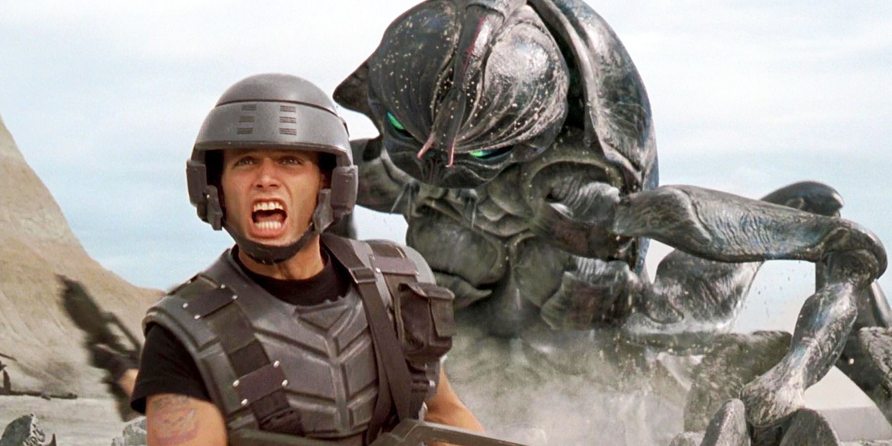 A big bug coming after Johnny Rico in Starship Troopers