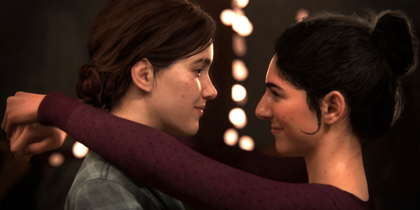 Ellie in The Last of Us Part 2 hugging another girl in the game's story.