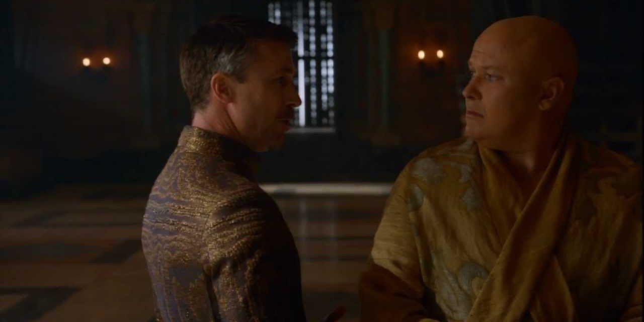 Varys and Littlefinger talk in the throne room in Game of Thrones.