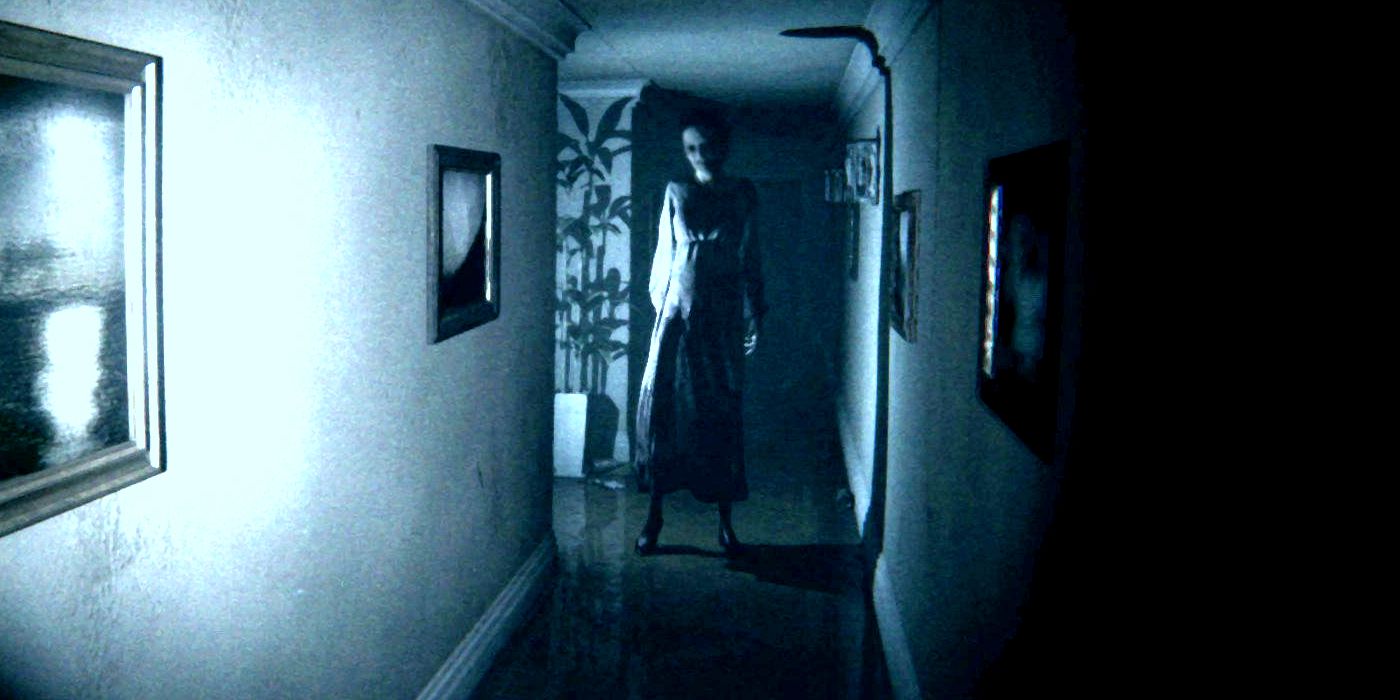 Lisa from Silent Hills' P.T. standing in an empty hallway.