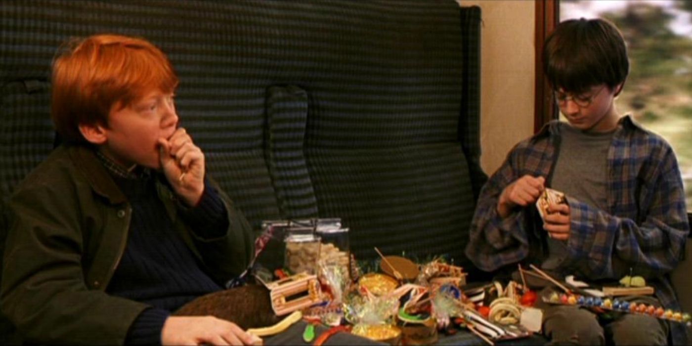 harry potter and ron eating food treats from the train trolly